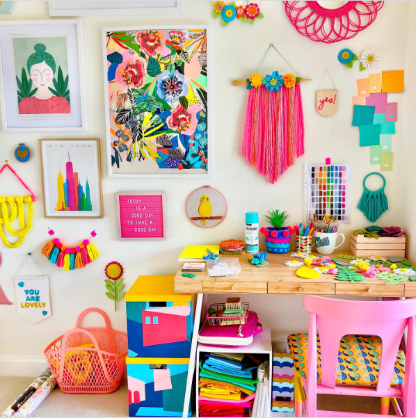 A custom neon sign with an uplifting quote or business name that adds personality and a modern touch to the office.